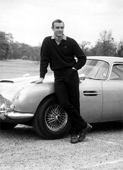 Bond, still in golf shoes after winning his match with Goldfinger