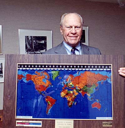 Gerald Ford holding a 'Real Wood' Geochron